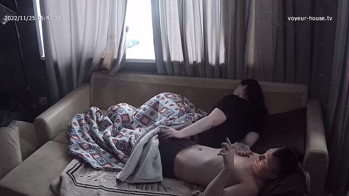 Indira_livingroom_couch_wakeup_check_dick_Kostja_realm18-cam13-1669380914
