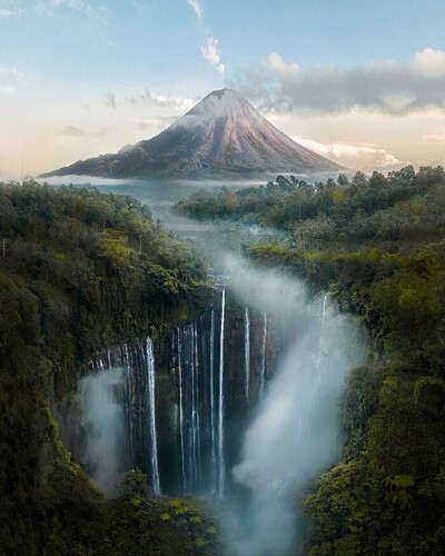 Here’s That One Place In Indonesia With A Volcano Behind Waterfalls