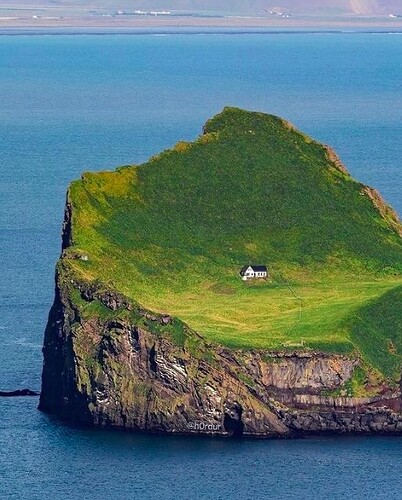 Smack dab in the middle of the ocean on a grassy rock. It’s either paradise… or level 100 hermit mode