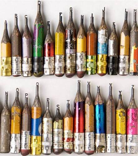 These are actual carved leads of pencils, while they are still attached to the wood counterpart. Amazing stuff